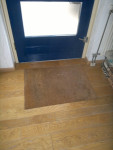 Voor renovatie deurmat